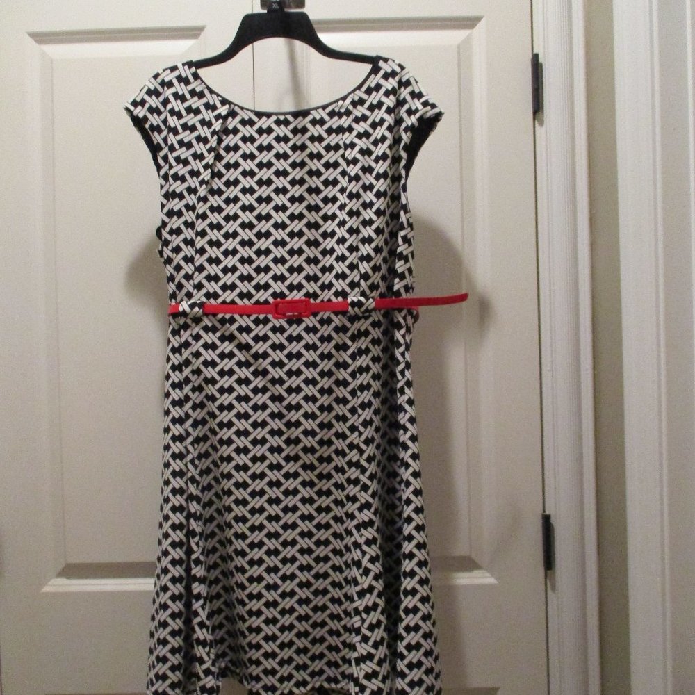 Black and white print dress with red belt